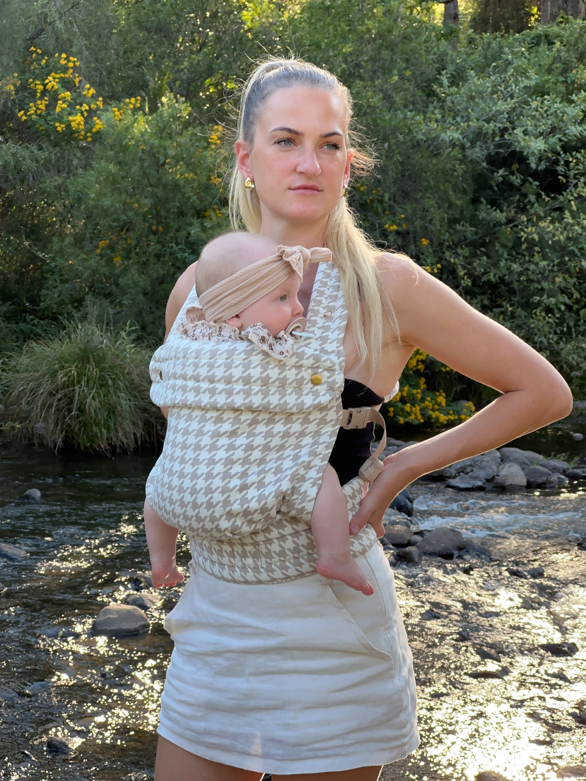Oat | Mum carrying baby in Haven Carrier outside in nature with tree's and creek
